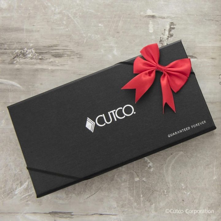 Black deluxe gift box finished with a red satin bow