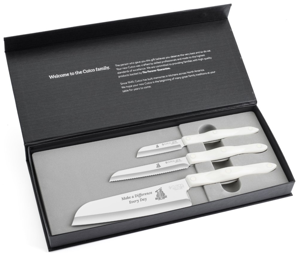 Three-piece set in a black gift box, santoku engraved with a company logo and message