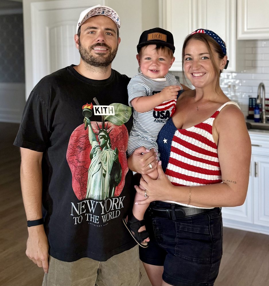 Luciano and Elizabeth Pataki with their son